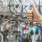male mechanic gesturing thumbs up bicycle workshop 23 2147892354 1 product-bottom